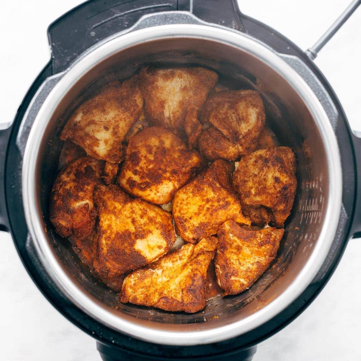 Seasoned chicken breasts in the Instant Pot.