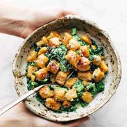 A picture of Sweet Potato Gnocchi with Broccoli Rabe and Garlic Sage Butter Sauce